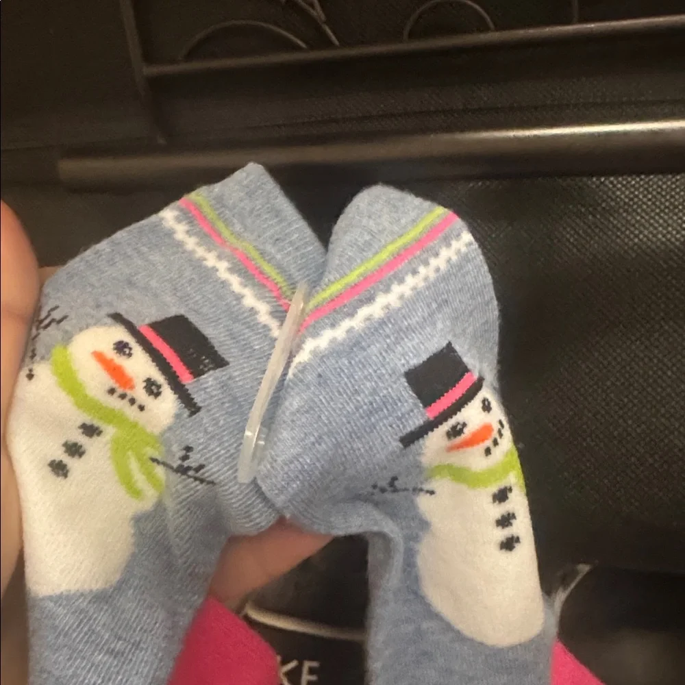 NWT pair of colorful Holiday/Winter socks.  Never been worn of course. Adult 7-9